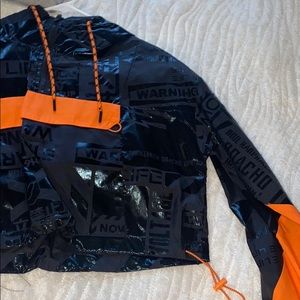 Cropped fluorescent windbreaker